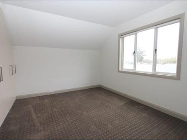 Modern Three Bedroom Townhouse in a Convenient Location
