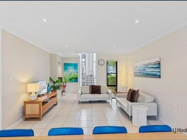 Modern Three Bedroom Townhouse with Pool Low Maintenance Living Great Location!