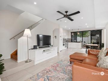 Modern three bedroom townhome with courtyard and city views