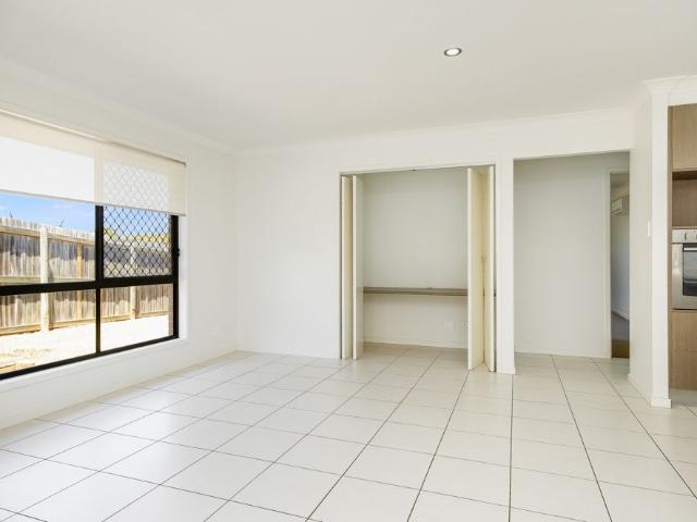 MODERN, THREE BEDROOM HOME WITH AIR CONDITIONING IN POPULAR AREA