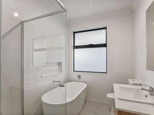 Modern Three Bedroom Home with Quality Finishes Throughout