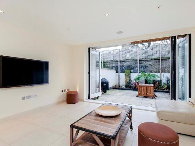 Modern three double bedroom townhouse with private front and back gardens in a gated mews, Willow Walk N1