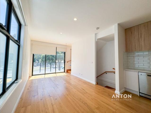 Modern Three Level Townhouse Offering Space, Style & Convenience