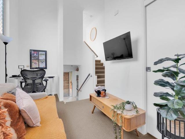 Modern Tri Level Townhouse with Private Courtyard in Prime Morningside Location