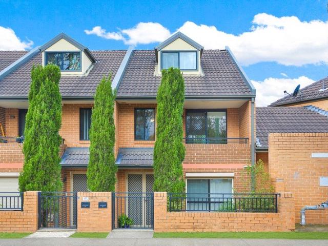 Modern Tri Level Townhouse located within walking distance to public transportation