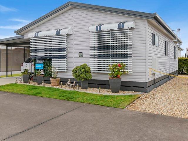Modern, two bedroom charming cottage, beautifully maintained with extra toilet