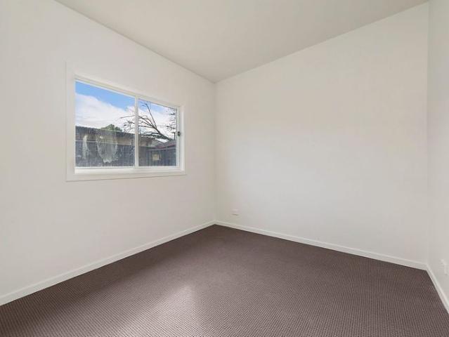 Modern Two Bedroom Gem with Private Yard!