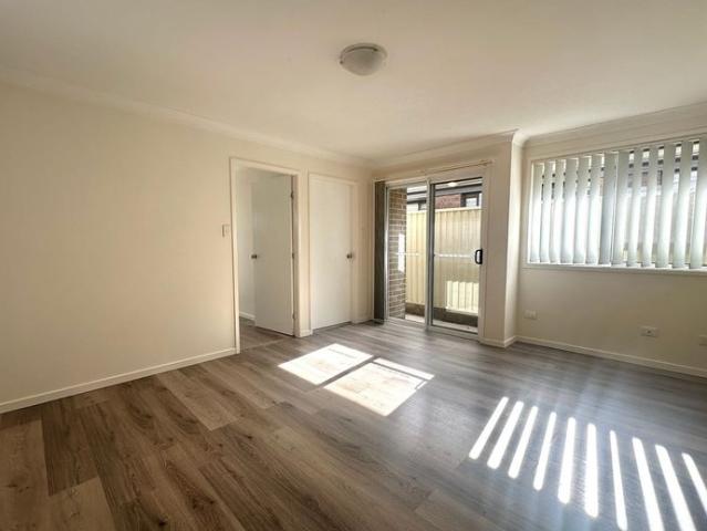 MODERN TWO BEDROOM DUPLEX WITH PRIVATE YARD