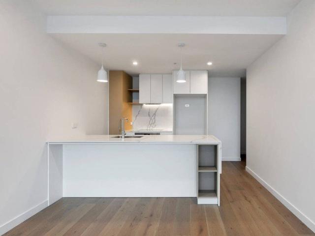 Modern Two Bedroom Home with Oversized Balcony in Prime Location