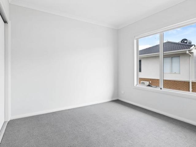 Modern Two Bedroom Home Available for Lease in Highly Sought After Surrey Green