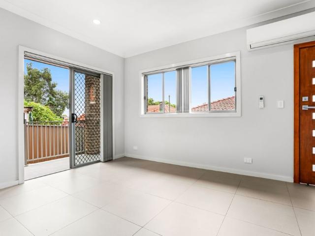 Modern Two Bedroom Home North Facing Courtyard!