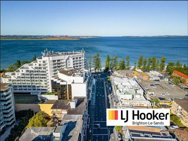 MODERN TWO BEDROOM + TWO BATHROOM HIGH RISE APARTMENT WITH CITY VIEWS