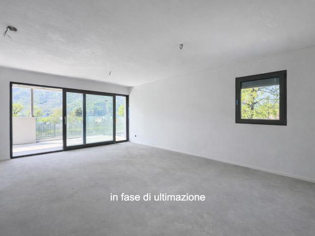 Moderne und neue 3.5 Zimmer Duplex Wohnung mit Garten in Melano