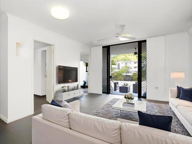 Modern Unit with Huge Patio & Pool Views – Prime Belgian Gardens Location
