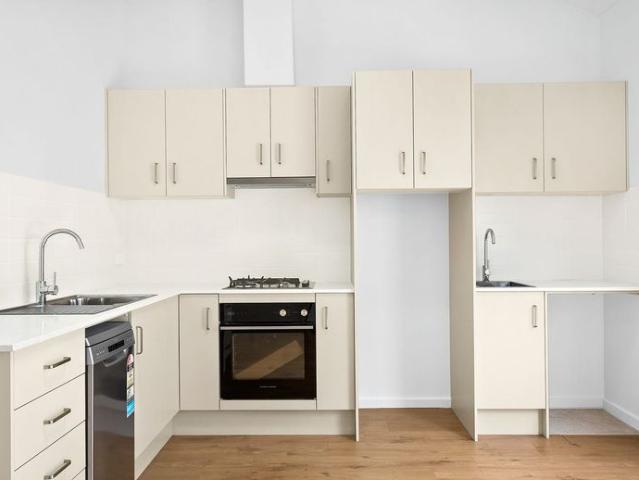 Modern Unit in a Boutique Complex!