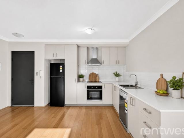 MODERN UNIT. SECURE LEASE. IMMEDIATE RENTAL INCOME