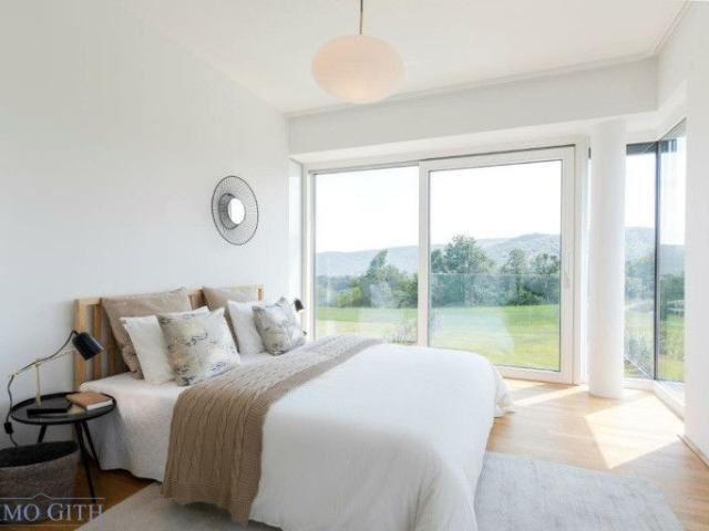 MODERN VILLA WITHIN A VILLA ENSEMBLE – LAREN LIVING – WITH UNIQUE FAR REACHING VIEWS IN GIESSHÜBL