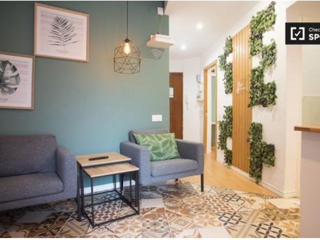 Moderna habitación en apartamento de 3 dormitorios en Gràcia