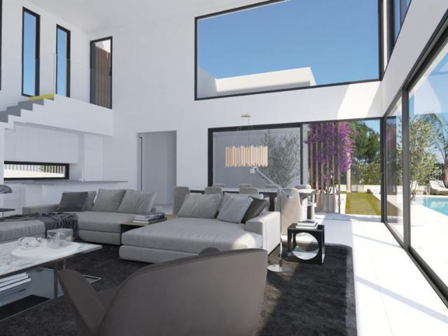 Moderna villa de obra nueva junto a un campo de golf en Estepona