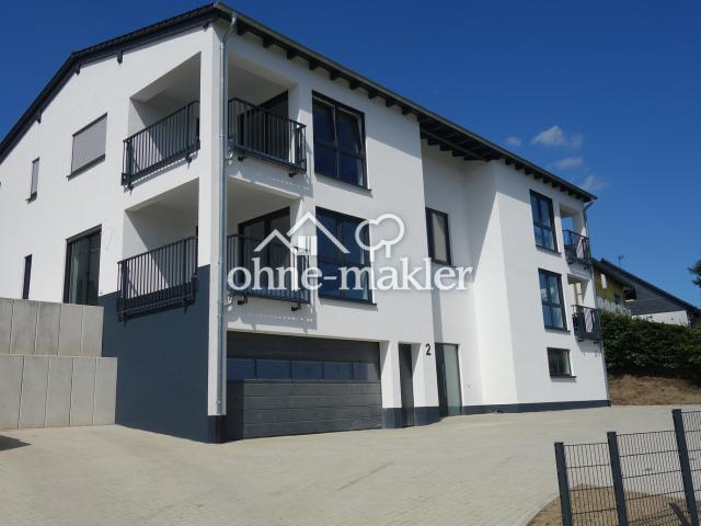 Neubau Wohnung mit Einbauküche und großer Terrasse!