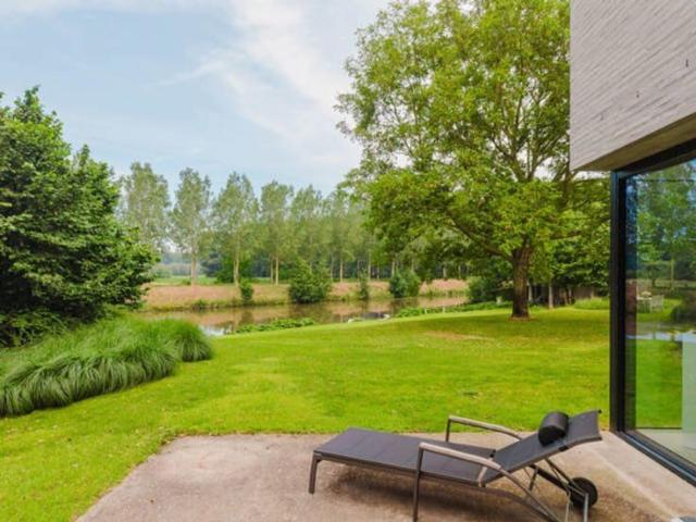 Moderne blokwoning te huur met zicht op de Leie in Astene