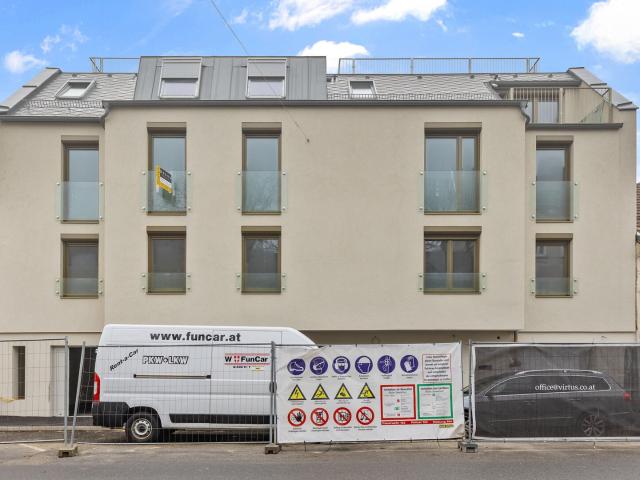 Moderne Dachgeschoss Neubau mit XXL Dachterrasse in super Lage