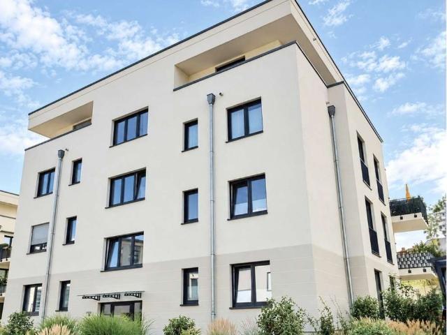 Moderne Dachgeschosswohnung in Neubaugemeinschaft