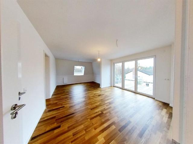 Moderne Dachgeschosswohnung in Waldtrudering: Zeitgemäßes Wohnen mit Weitblick und Natur vor der Tür