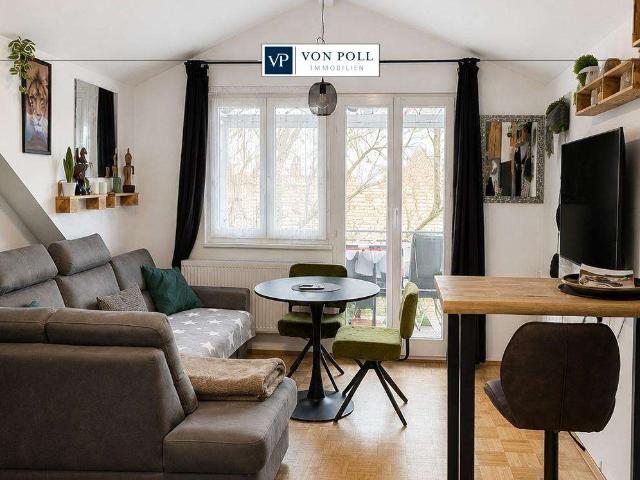 Moderne Dachgeschosswohnung mit traumhaftem Ausblick rentabel vermietet!