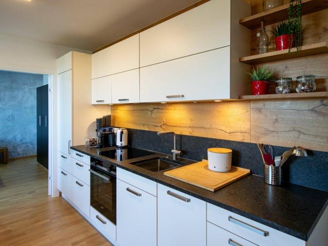 Moderne DG Wohnung mit Terrasse und Klimaanlage I Garagenplatz vorhanden