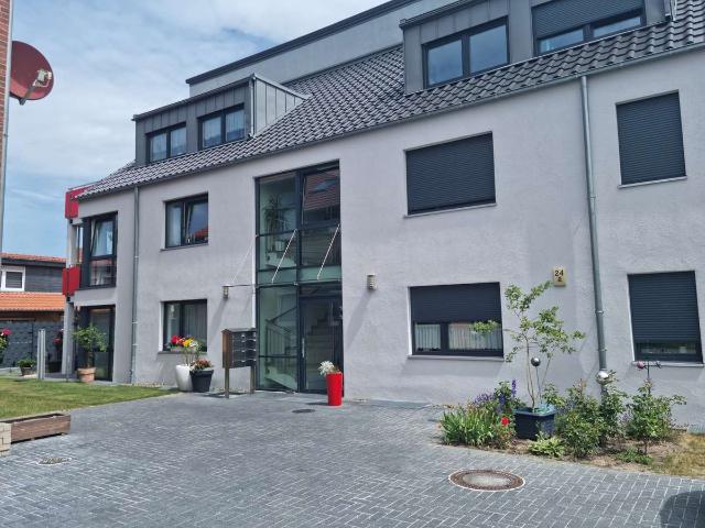 Moderne ebenerdige Eigentumswohnung mit Garten und PKW Stellplatz