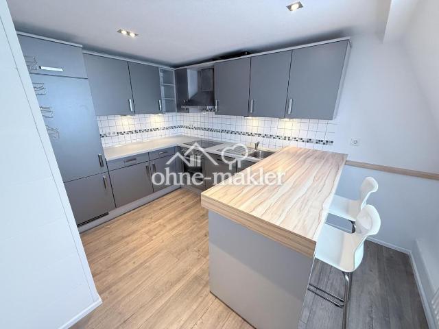 Moderne Eleganz: Stilvoll modernisierte Dachgeschosswohnung in bester Lage