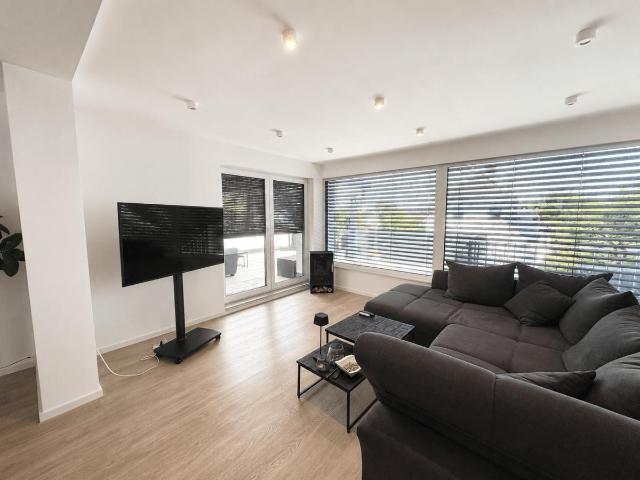 Moderne, energetisch sanierte Wohnung mit Garten, Sauna und zusätzlichem Nutzbereich