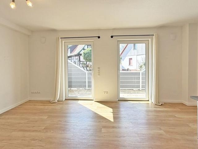 Moderne Erdgeschoss Singlewohnung mit Terrasse und Einbauküche