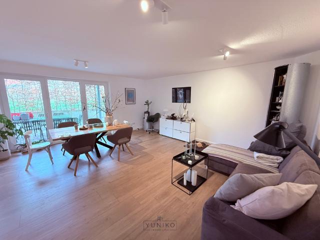 Moderne Erdgeschosswohnung mit großzügigem Wohn /Essbereich, Terrasse und hochwertiger Einbauküche
