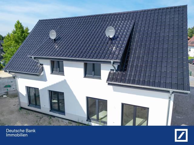 Moderne, hochwertige Doppelhaushälfte in begehrter Lage von Schloß Holte – Erstbezug in unmittelbarer Nähe zum Netto