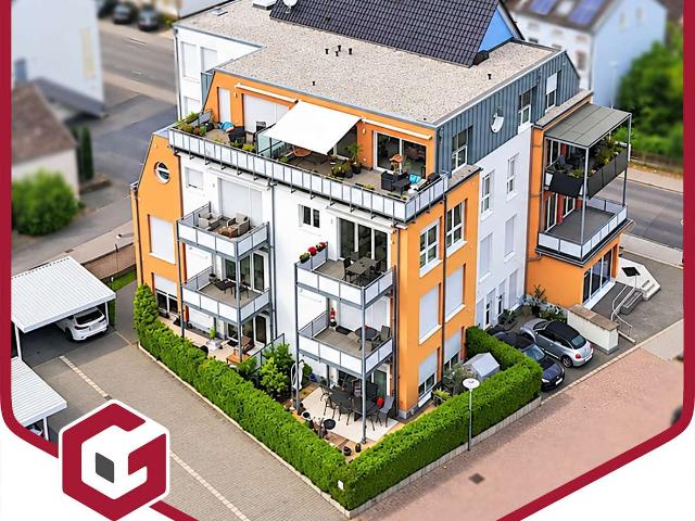 Moderne und energieeffiziente Erdgeschosswohnung mit Terrasse und 2 Stellplätzen in zentraler Lage