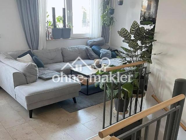 Moderne und hochwertig ausgestattete 3 ZKB Maisonette Terrassenwohnung mit sonnigem Garten
