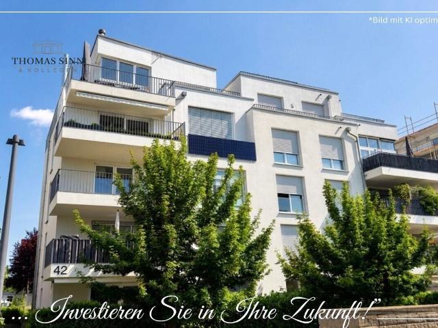 Moderne und lichtdurchflutete 3 Zimmer Wohnung mit Sonnenbalkon und Tiefgaragenstellplatz