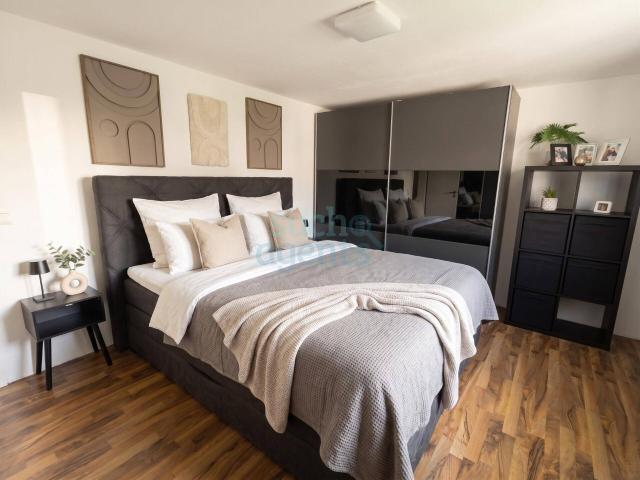 Moderne vermietete 74 m² Wohnung mit Stellplatz und Gartenmitbenutzung