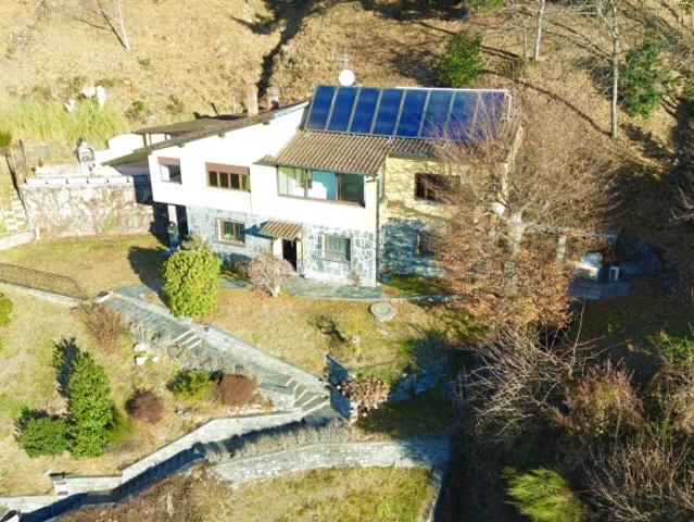 Moderne villa unifamiliare con 6.5 camere in una posizione idilliaca ad Aranno, nel Canton Ticino