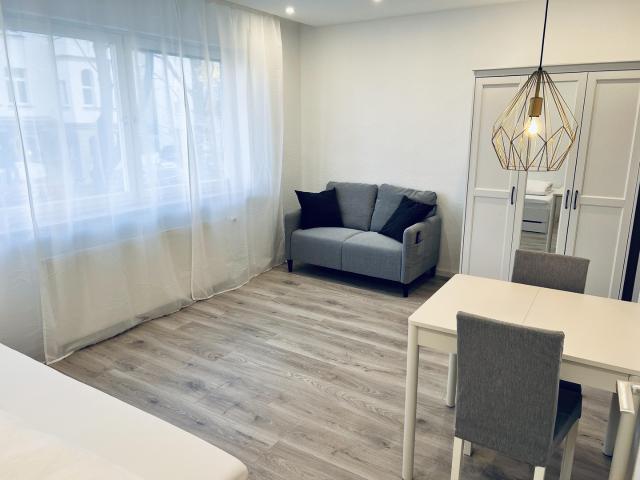 Moderne vollmöblierte 1 Zimmerwohnung mit Blick in die Stadt
