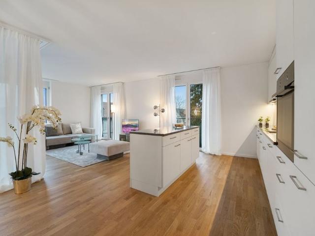 Moderne Wohnung mit Gartensitzplatz