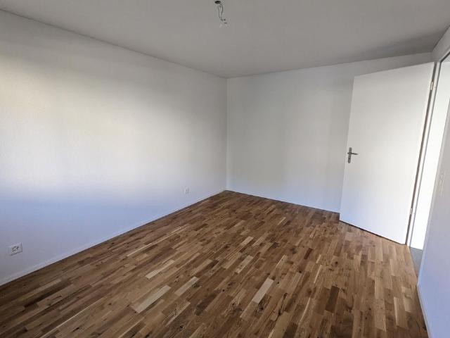 Moderne 2.5 Zimmer Garten Wohnung mit Sitzplatz