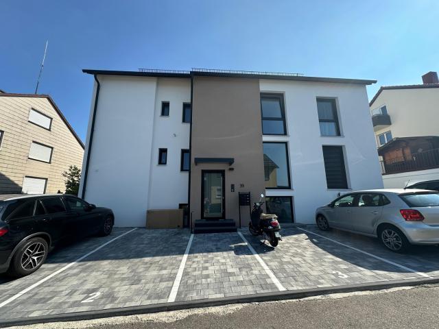 Moderne 2,5 Zimmer Neubauwohnung in ruhiger Lage