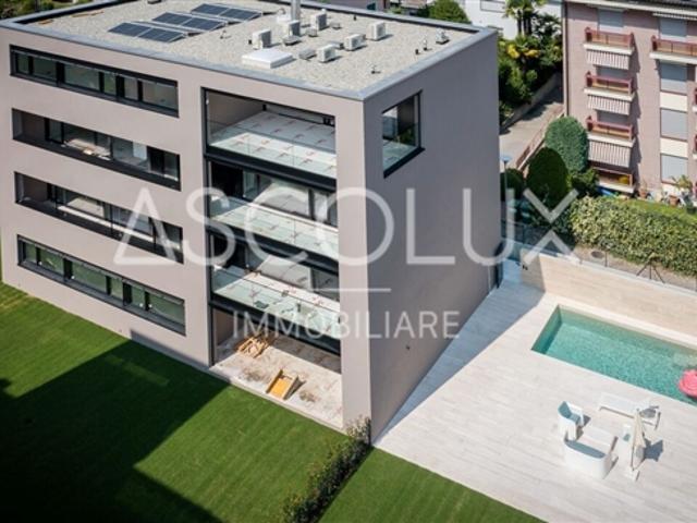 Moderne 2.5 Zimmer Wohnung in Residenz mit beheiztem Aussenpool und Sauna | Modernes 2.5 Zimmer Apartment in Residenz mit beheiztem Aussenpool und Sauna