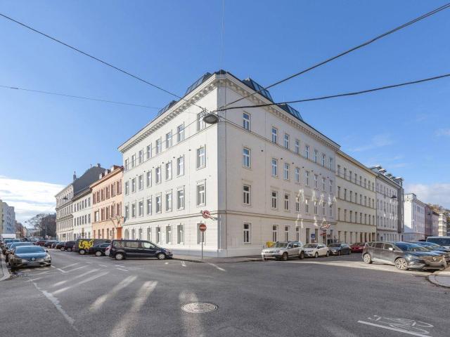 Moderne 2 Zimmer DG Wohnung in 1100 Wien – Erstbezug mit Einbauküche & Aufzug!