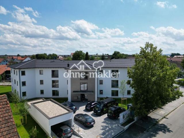Moderne 2 Zimmer Erdgeschosswohnung mit 34 m² Garten, Tiefagarage, Aufzug und Glasfaseranschluss