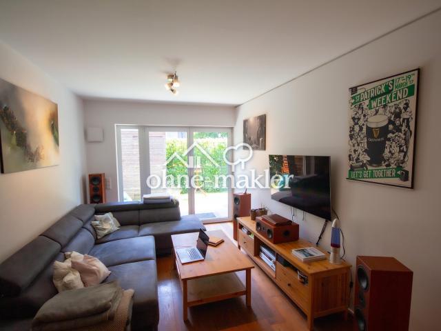 Moderne 2 Zimmer Erdgeschosswohnung mit Terrasse, hochwertiger Einbauküche und TG Stellplatz