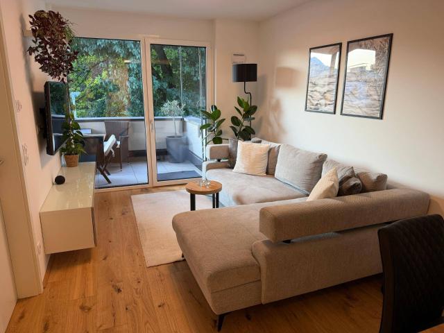 Moderne 2 Zimmer Wohnung mit Balkon, Tiefgarage & privater E Ladestation in Schwaz